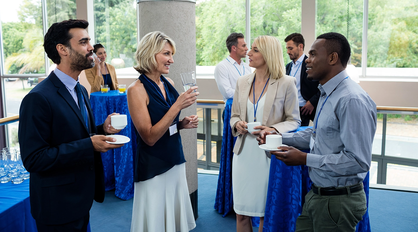 Illustration of attendees using a personalized event schedule on mobile devices during an event